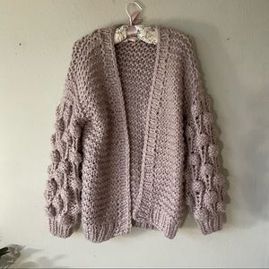 Sweet Generis oversized wool sweater with puff details on sleeves